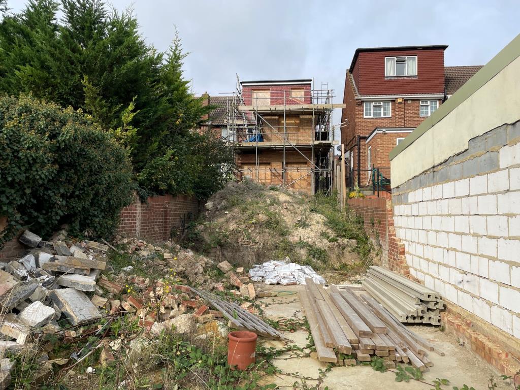 Lot: 134 - SEMI-DETACHED PROPERTY WITH DEVELOPMENT OPPORTUNITY TO BE COMPLETED - Rear view showing rear extension and dormer